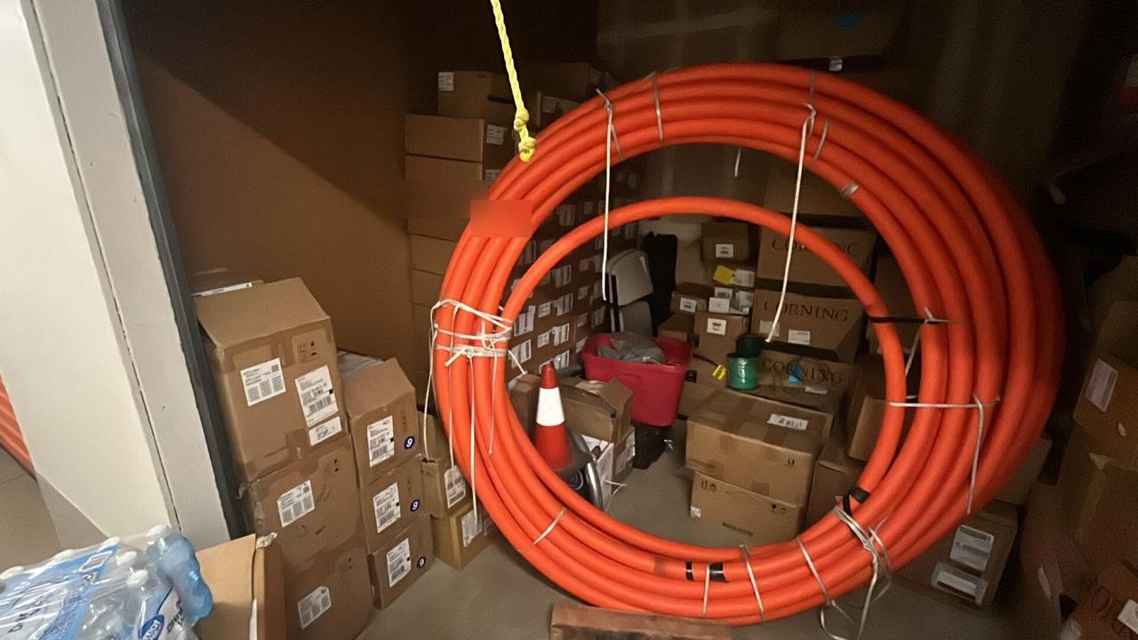 Smart technology service detail: fiber splicing and cable preparation detail with cable handling visible