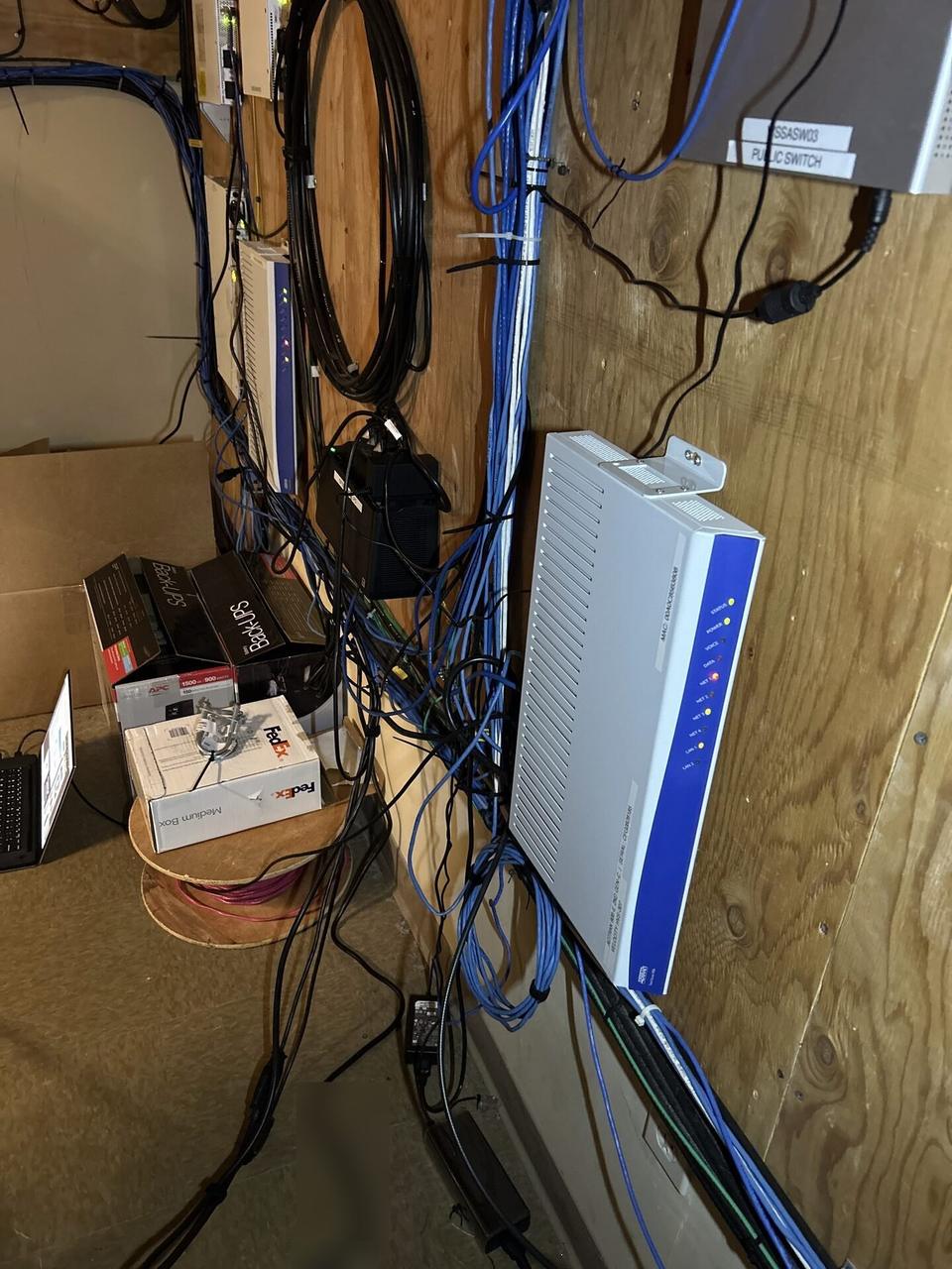 Onsite service photo showing structured cabling inside a network rack with rack cabling organized