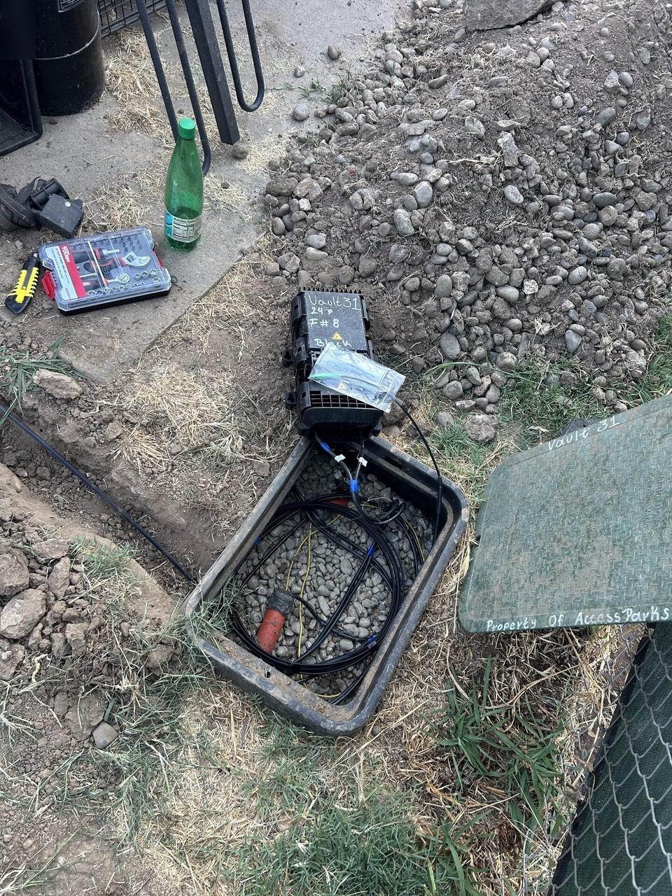 Smart technology service detail: outdoor fiber distribution unit for customer drops with cable handling visible