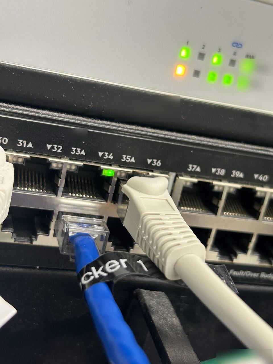 Public-safe portfolio image of low-voltage hardware and device cabling before trim-out or final setup