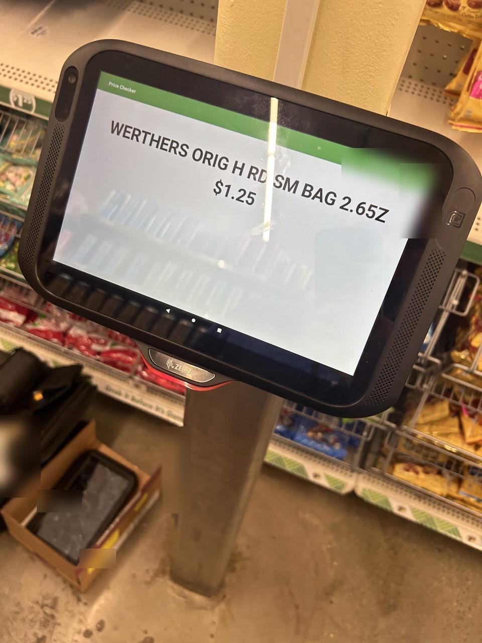 Onsite service photo showing retail price checker and POS lookup station