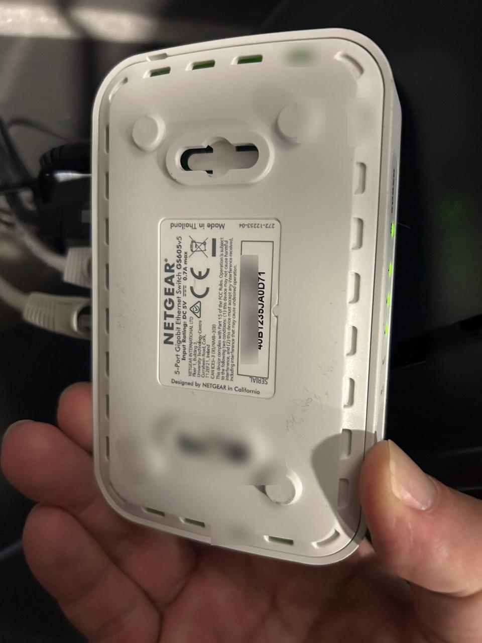 Public-safe portfolio image of low-voltage hardware and device cabling at the device handoff point