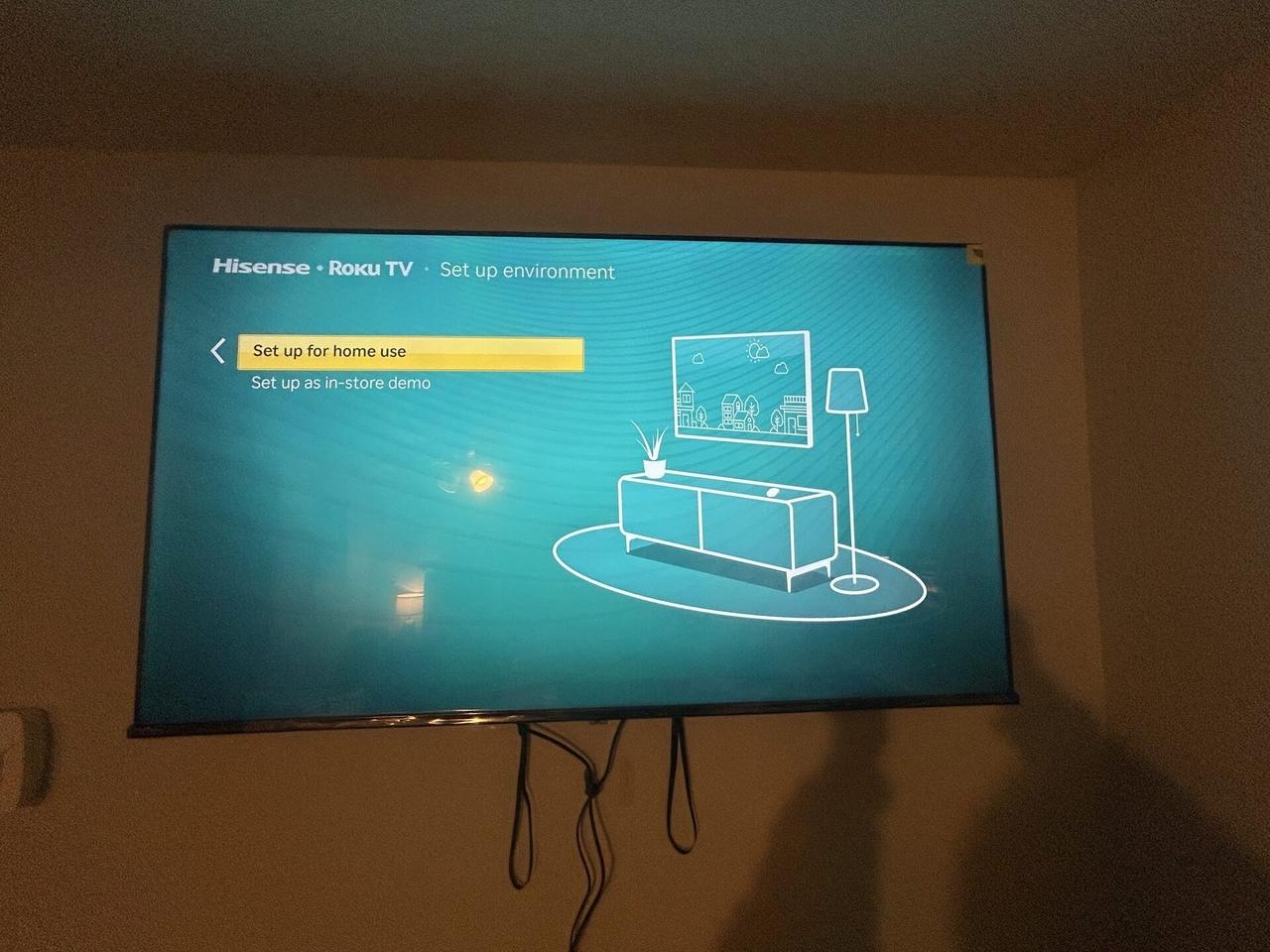Alrty portfolio view of streaming device and television setup context with private room details omitted