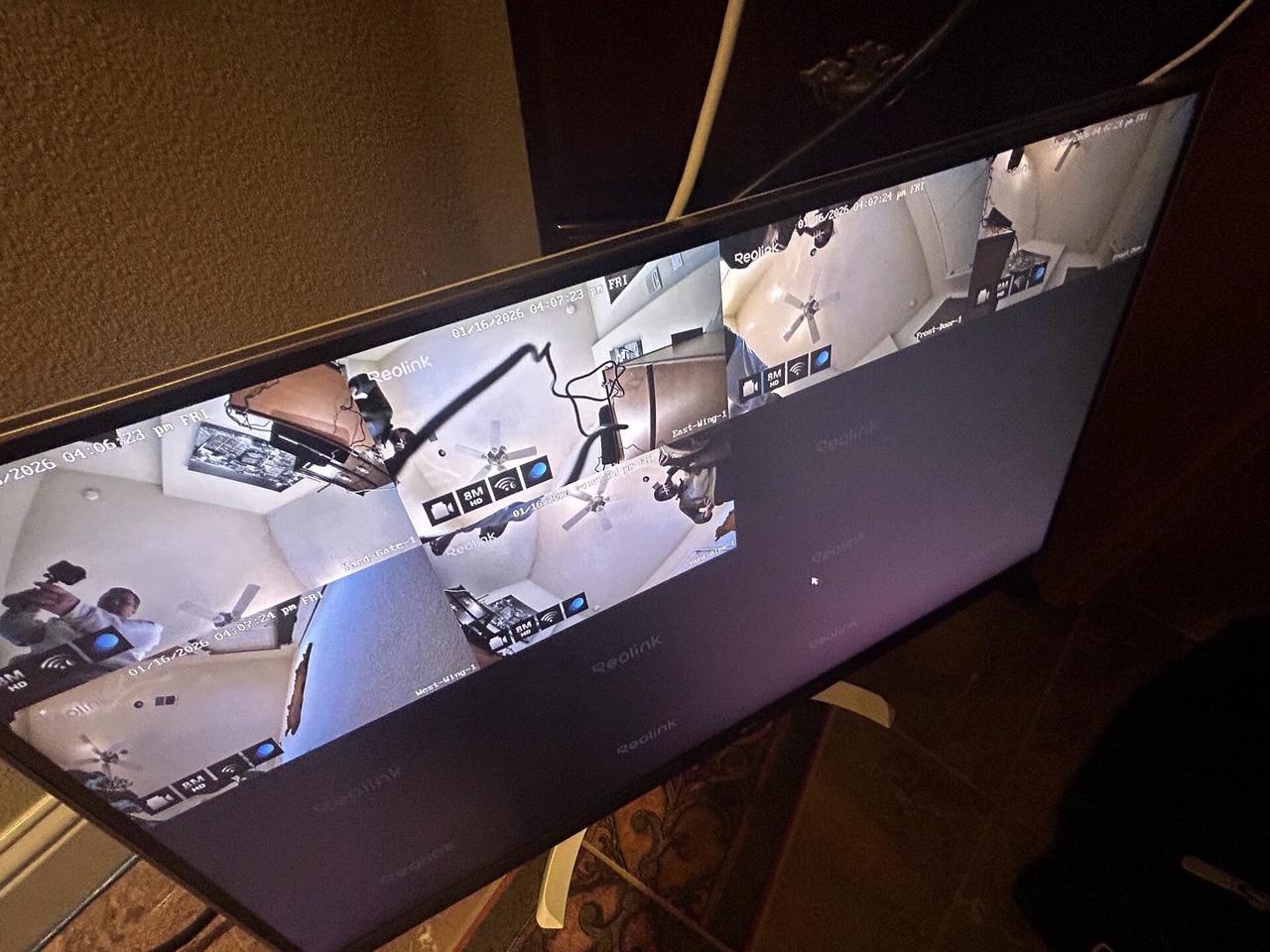 Alrty field photo with CCTV equipment and camera network handoff with private views omitted