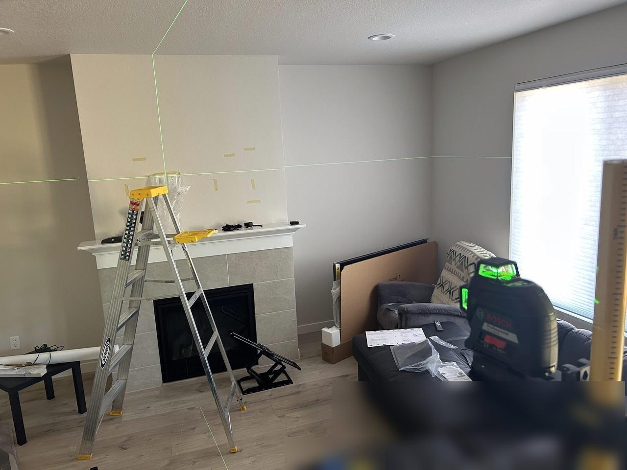 Public-safe portfolio image of display bracket or mounting preparation onsite during TV service preparation
