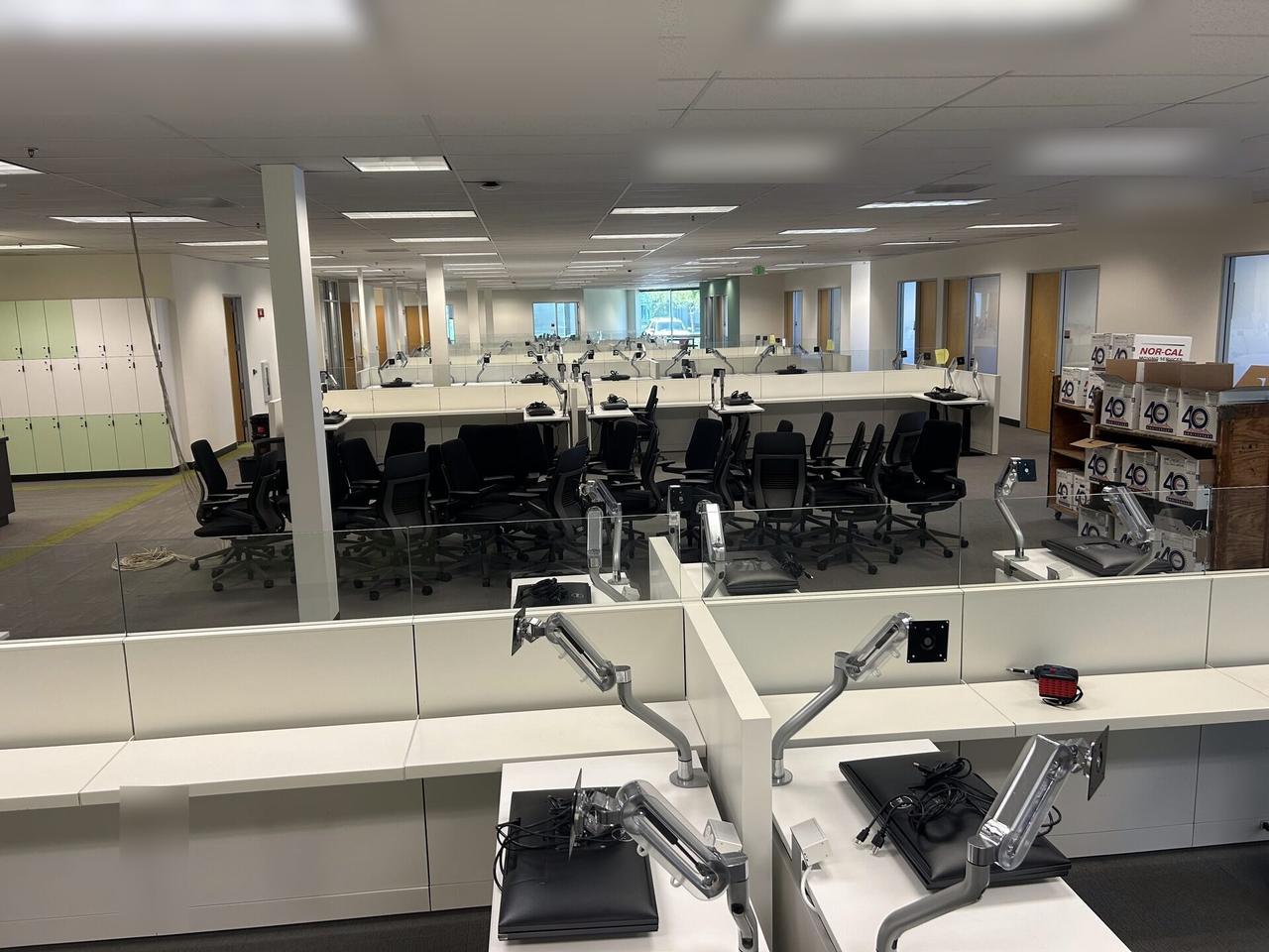 Public-safe portfolio image of desk-side workstation setup during onsite service during workstation validation