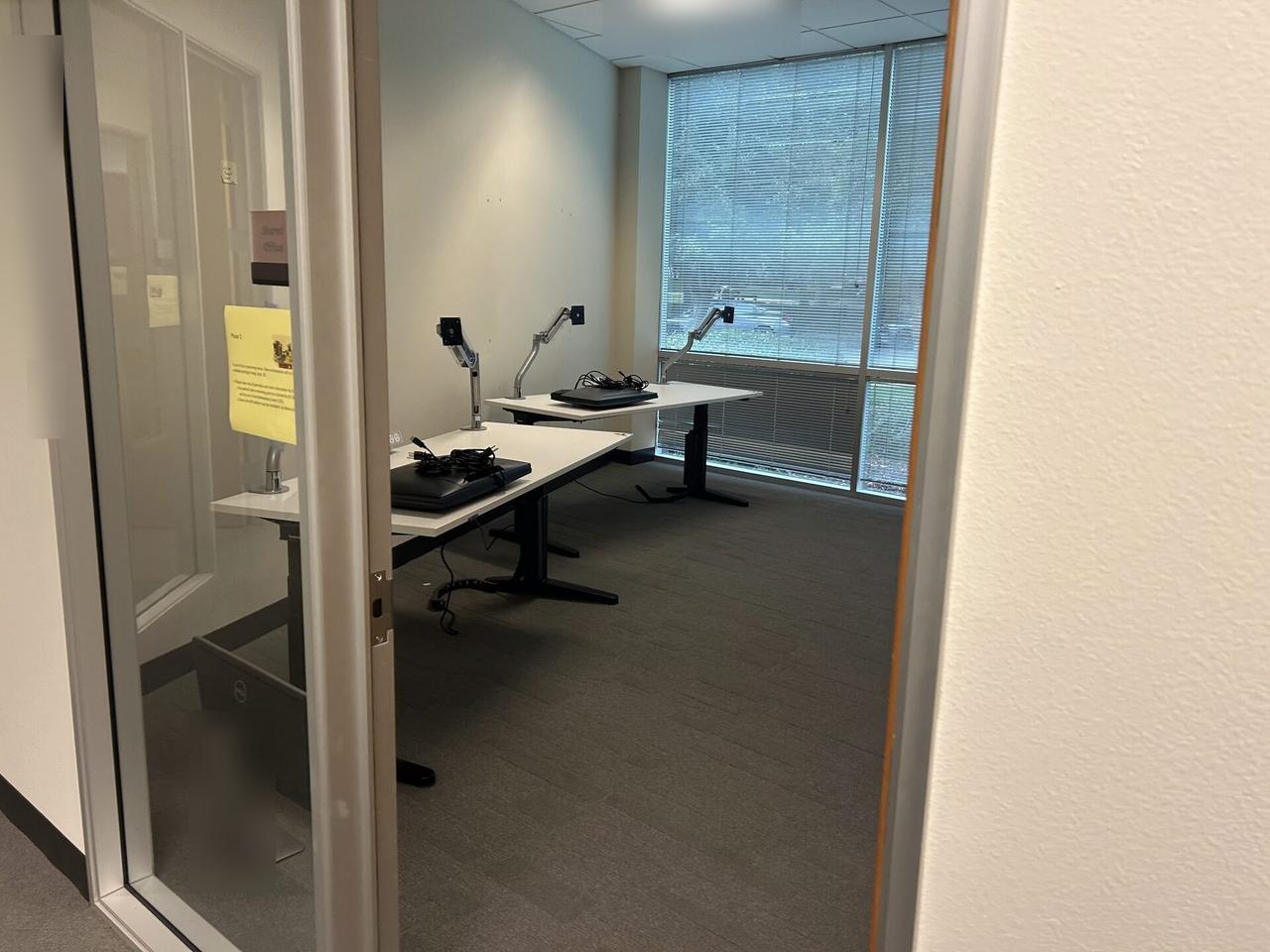 Office workstation setup with monitors during workstation validation during an Alrty onsite service visit