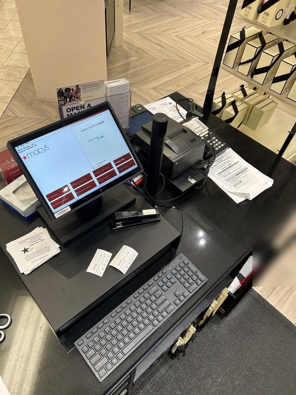 Onsite service photo showing credit-card payment terminal and POS hardware