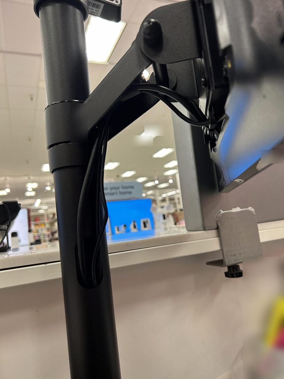 Onsite service photo showing checkout station POS hardware at the checkout counter