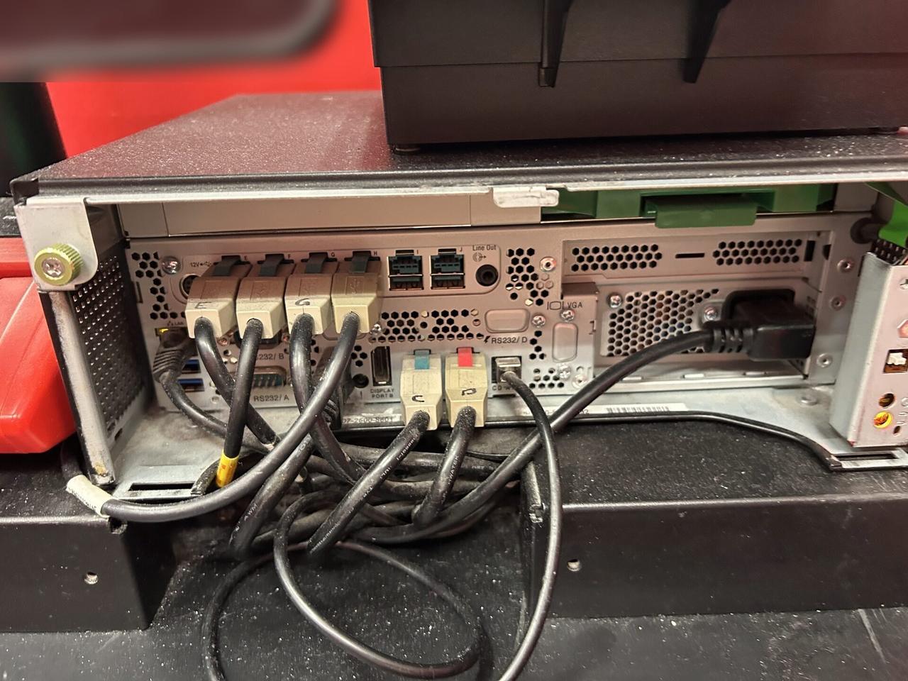 Checkout station POS hardware during register setup during an Alrty onsite service visit