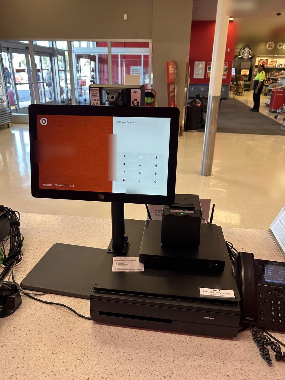 Alrty field photo with checkout station POS hardware at a checkout lane