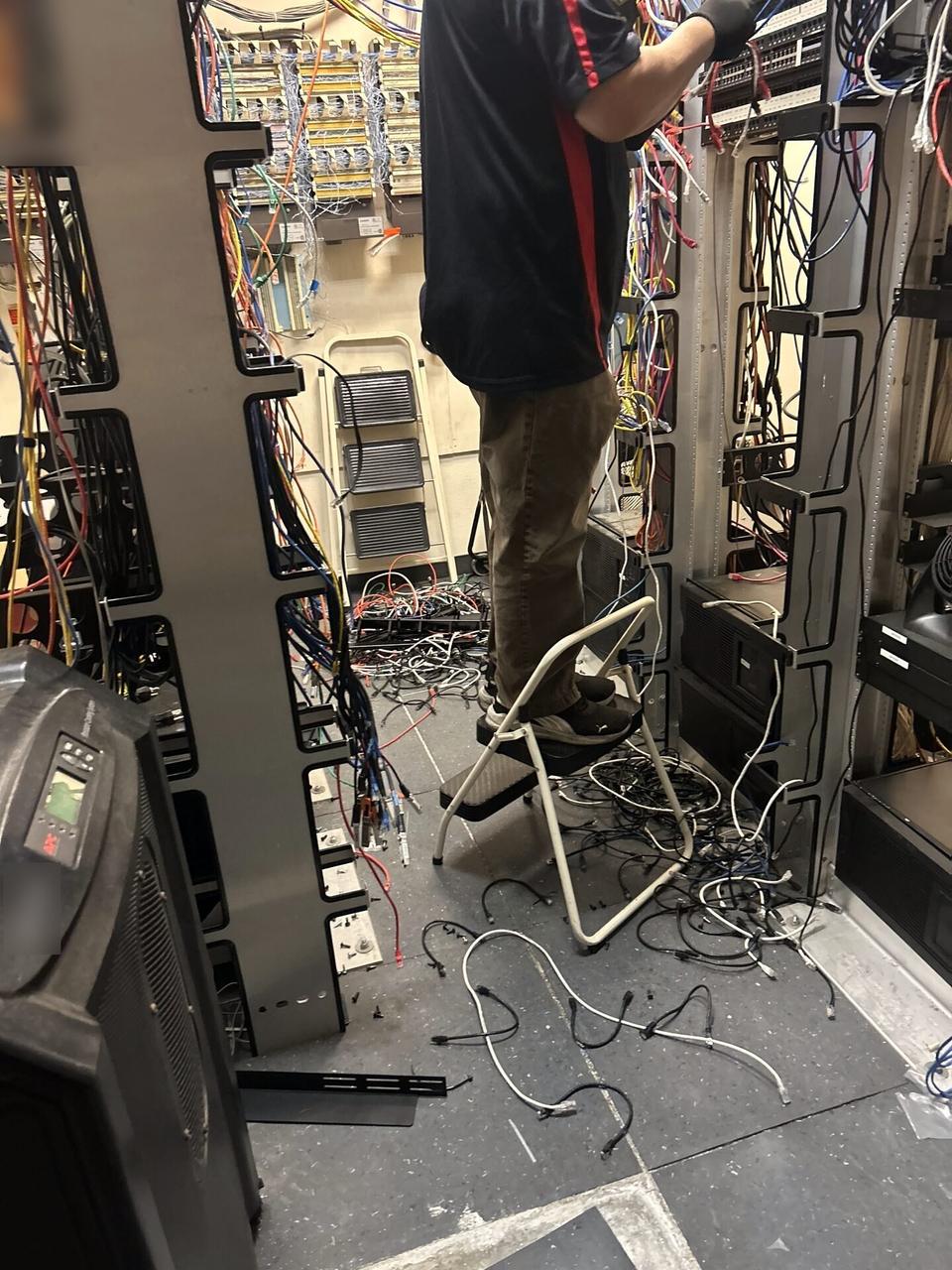 Alrty field photo with server-room teardown and network equipment inventory