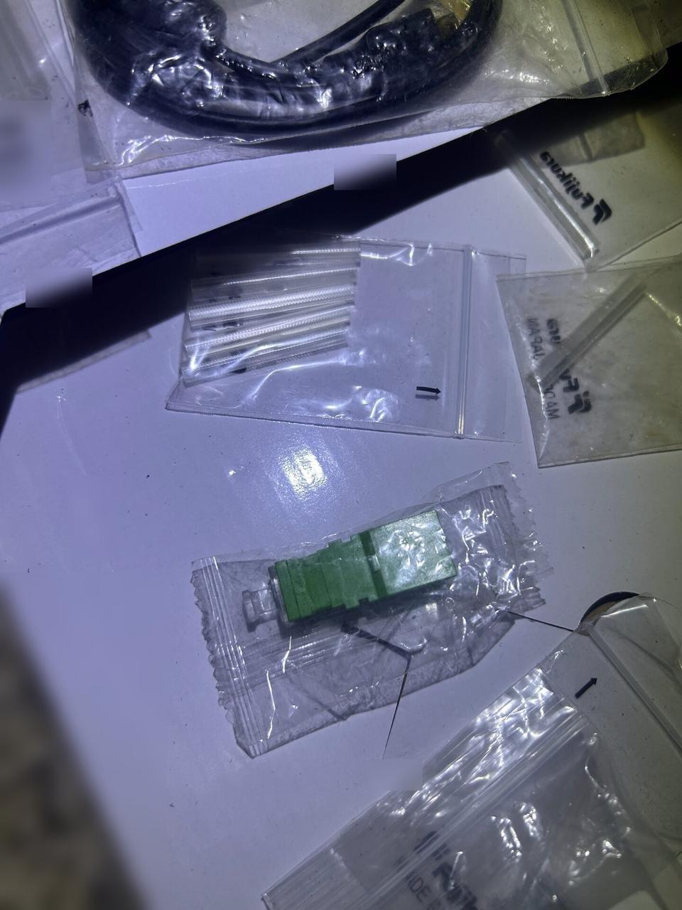 Public-safe portfolio image of fiber testing or optical signal verification during fiber preparation