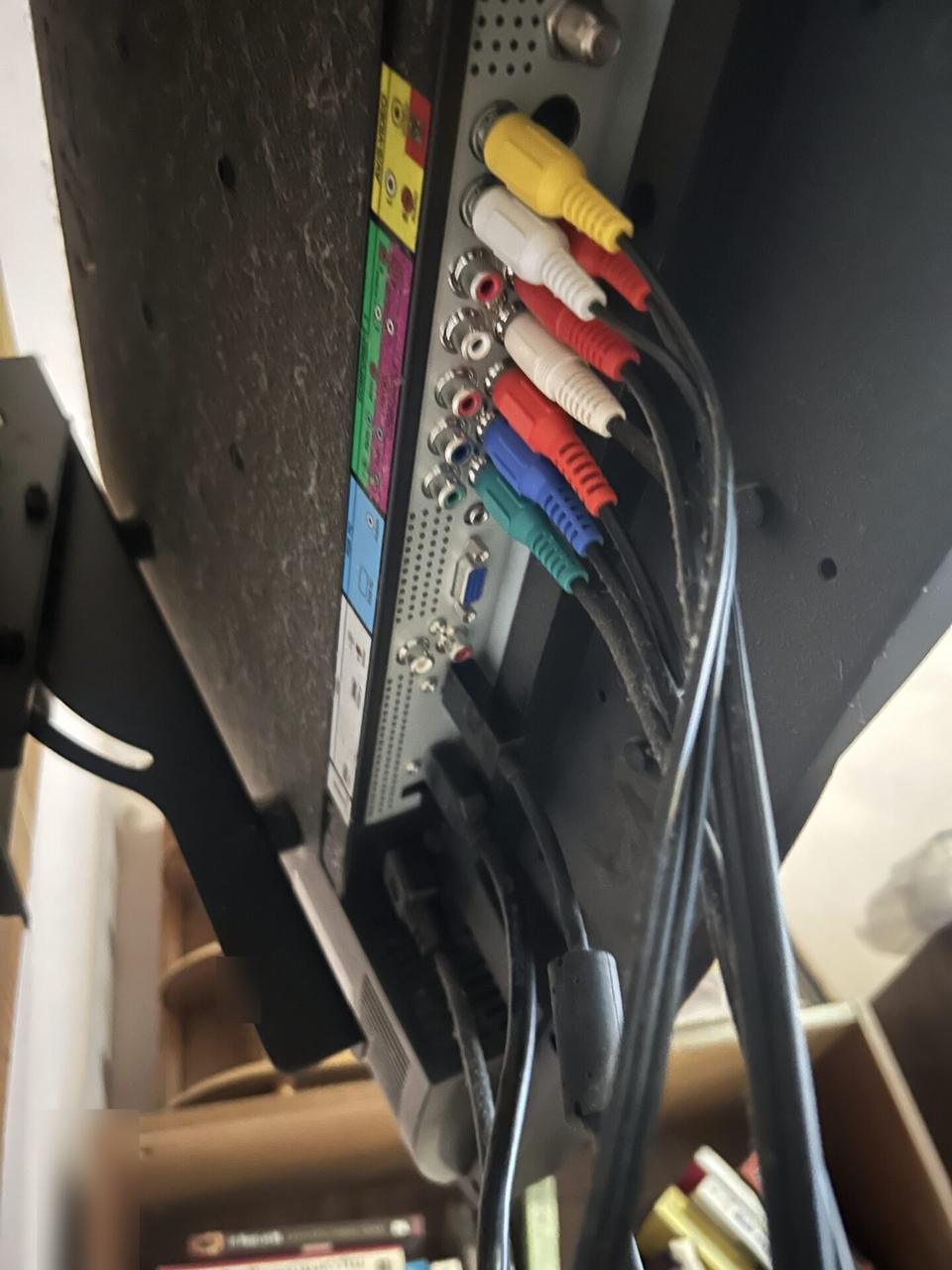 Home theater cabling and display service detail before final viewing checks documented for a smart technology service call